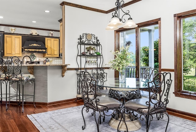 204 Moore Rd, Germantown, NY 12526 - dining area featuring crown molding, dark wood-style floors, baseboards, and recessed lighting