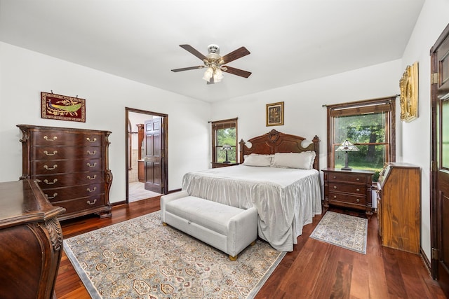 204 Moore Rd, Germantown, NY 12526 - bedroom with dark wood-type flooring, ceiling fan, and connected bathroom