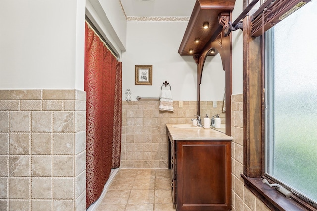 204 Moore Rd, Germantown, NY 12526 - bathroom featuring tile walls, vanity, wainscoting, and tile patterned flooring