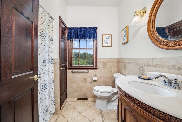 204 Moore Rd, Germantown, NY 12526 - bathroom with tile patterned floors, vanity, tile walls, toilet, and wainscoting