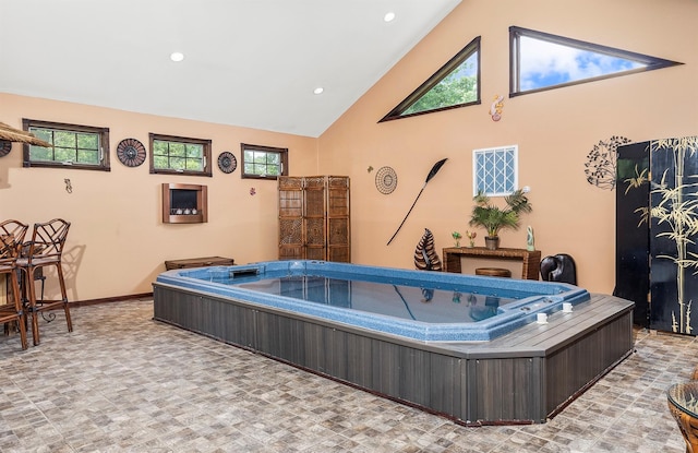 204 Moore Rd, Germantown, NY 12526 - misc room featuring high vaulted ceiling, baseboards, plenty of natural light, and recessed lighting