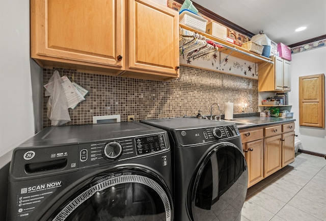 204 Moore Rd, Germantown, NY 12526 - washroom featuring washing machine and dryer, cabinet space, and light tile patterned flooring