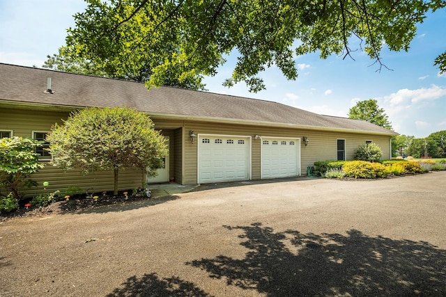 204 Moore Rd, Germantown, NY 12526 - view of home's exterior featuring a garage and driveway