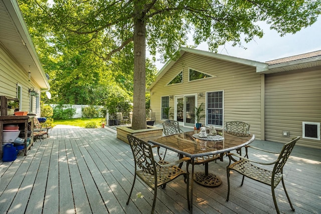 204 Moore Rd, Germantown, NY 12526 - wooden deck with outdoor dining area and a fenced backyard
