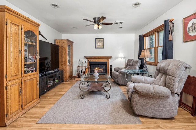 204 Moore Rd, Germantown, NY 12526 - living area featuring a ceiling fan, light wood-type flooring, a glass covered fireplace, and recessed lighting