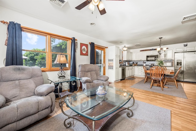 204 Moore Rd, Germantown, NY 12526 - living area featuring a ceiling fan and light wood finished floors