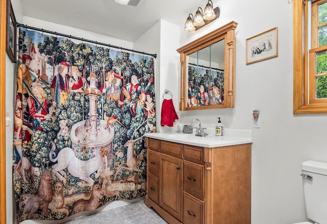 204 Moore Rd, Germantown, NY 12526 - full bath featuring toilet, vanity, tile patterned flooring, and curtained shower