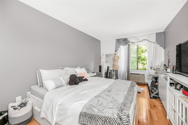 608 Kemeys Cv Unit 6-08, Briarcliff Manor, NY 10562 - bedroom with light wood finished floors and a wall mounted AC