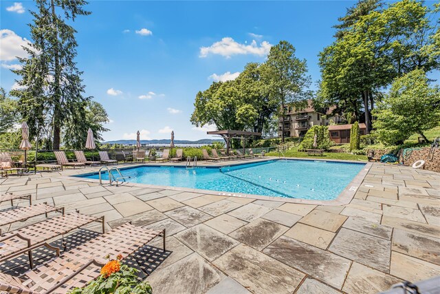 608 Kemeys Cv Unit 6-08, Briarcliff Manor, NY 10562 - community pool featuring a patio area
