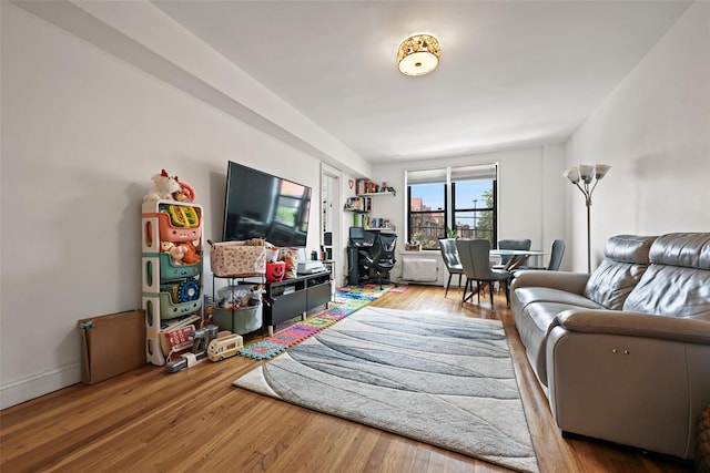 86-04 Grand Ave Unit 4D, Elmhurst, NY 11373 - living room with wood finished floors and baseboards