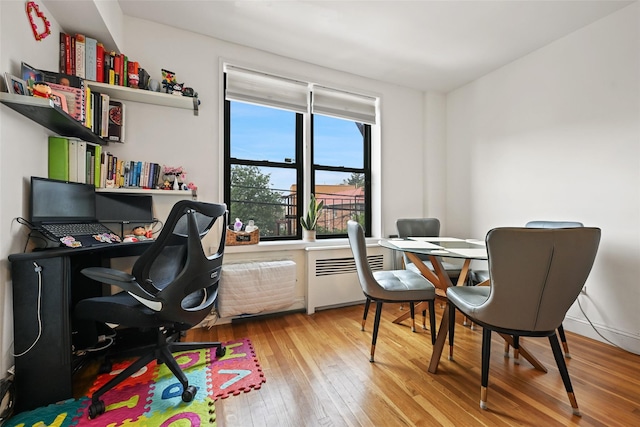 86-04 Grand Ave Unit 4D, Elmhurst, NY 11373 - office space with radiator and wood-type flooring