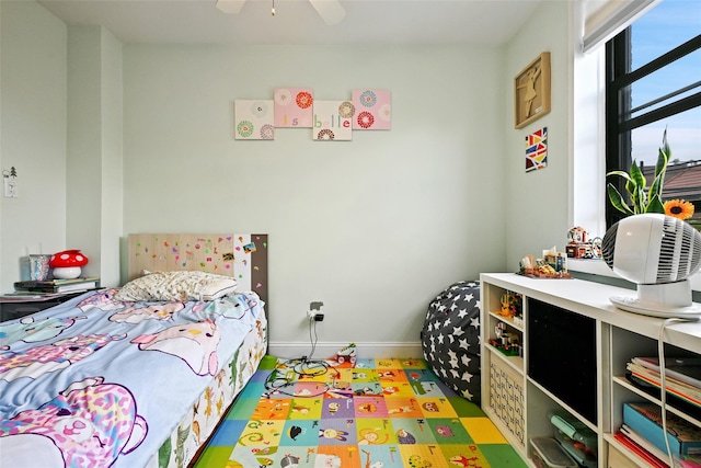 86-04 Grand Ave Unit 4D, Elmhurst, NY 11373 - bedroom featuring baseboards and a ceiling fan