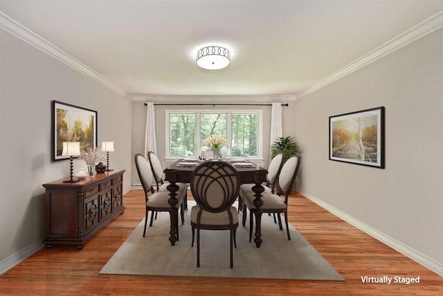 2 Wooded Ct, Lloyd Harbor, NY 11743 - dining space with crown molding, baseboards, and light wood-style floors