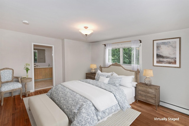 2 Wooded Ct, Lloyd Harbor, NY 11743 - bedroom with a baseboard heating unit, wood finished floors, and ensuite bathroom
