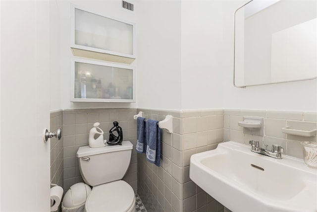 2 Fordham Hill Oval Unit 2F, Bronx, NY 10468 - half bath with tile walls and a wainscoted wall