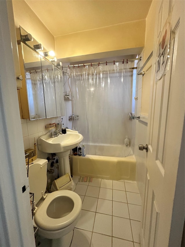 150-11 72nd Rd Unit 6A, Flushing, NY 11367 - full bathroom featuring tile patterned flooring, shower / bathtub combination with curtain, toilet, and tasteful backsplash