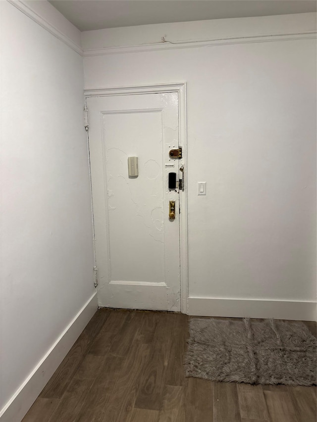 3000 Valentine Ave Unit 3E, Bronx, NY 10458 - doorway to outside with dark wood-style flooring and baseboards