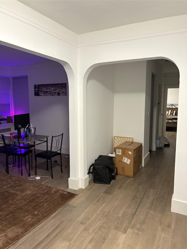 3000 Valentine Ave Unit 3E, Bronx, NY 10458 - dining area featuring arched walkways and wood finished floors