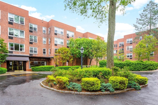 1299 Palmer Ave Unit 332, Larchmont, NY 10538 - view of apartment building / complex featuring uncovered parking