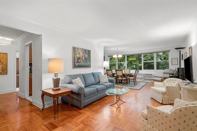 1299 Palmer Ave Unit 332, Larchmont, NY 10538 - living room featuring ornamental molding and a chandelier