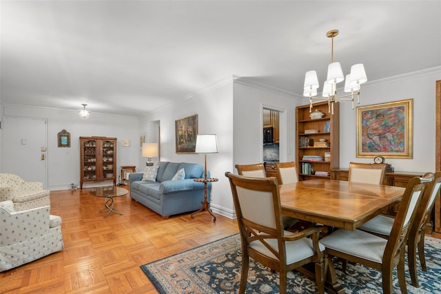 1299 Palmer Ave Unit 332, Larchmont, NY 10538 - dining area featuring ornamental molding and a chandelier