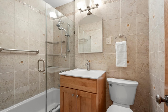 1299 Palmer Ave Unit 332, Larchmont, NY 10538 - bathroom with tile walls, vanity, and shower / bath combination with glass door