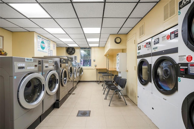 1299 Palmer Ave Unit 332, Larchmont, NY 10538 - community laundry with washer and clothes dryer, stacked washer / dryer, and light tile patterned floors