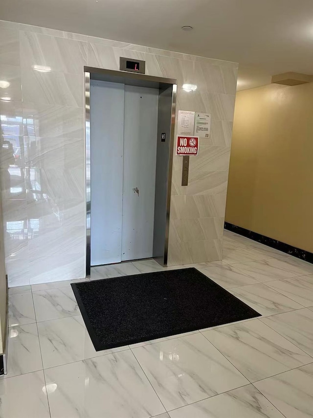 31-53 Linden Pl Unit 2E, Flushing, NY 11354 - building lobby featuring tile walls