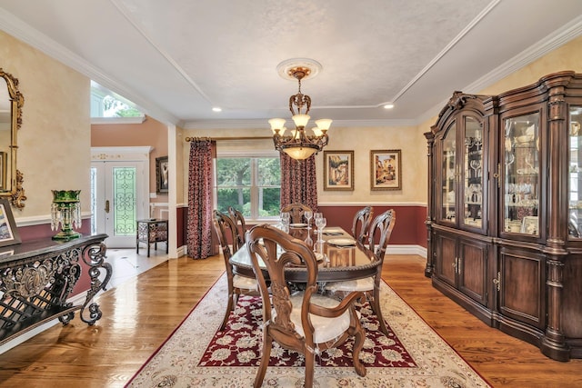 13 Locust Ln, Upper Brookville, NY 11545 - dining space with a chandelier, plenty of natural light, wood finished floors, and crown molding