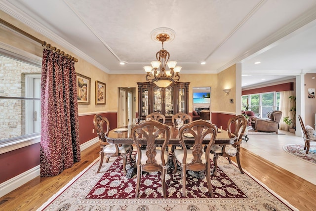 13 Locust Ln, Upper Brookville, NY 11545 - dining room featuring a chandelier, light wood-type flooring, and crown molding