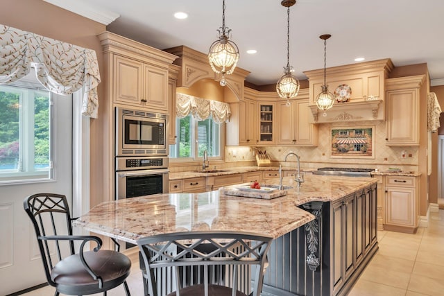 13 Locust Ln, Upper Brookville, NY 11545 - kitchen featuring appliances with stainless steel finishes, healthy amount of natural light, light tile patterned floors, a kitchen breakfast bar, and recessed lighting