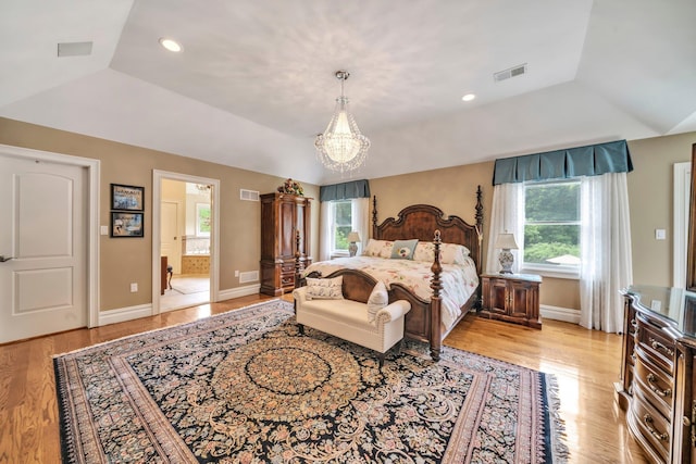 13 Locust Ln, Upper Brookville, NY 11545 - bedroom with light wood finished floors, a chandelier, vaulted ceiling, ensuite bathroom, and recessed lighting
