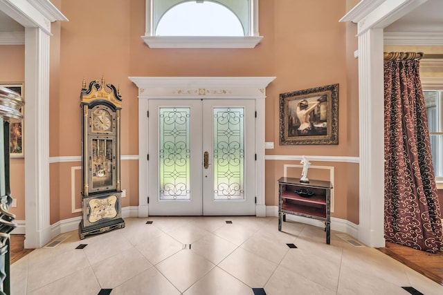 13 Locust Ln, Upper Brookville, NY 11545 - tiled entryway with french doors, a high ceiling, and ornate columns