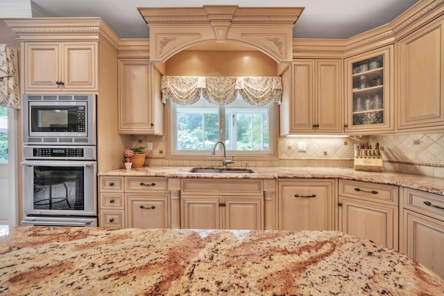13 Locust Ln, Upper Brookville, NY 11545 - kitchen with appliances with stainless steel finishes, cream cabinets, light stone counters, and backsplash