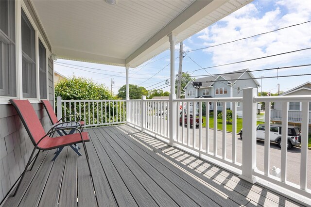 3717 Somerset Dr, Seaford, NY 11783 - wooden terrace featuring a residential view
