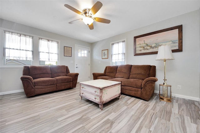 3717 Somerset Dr, Seaford, NY 11783 - living area featuring a ceiling fan, light wood-type flooring, and baseboards