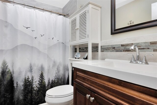 3717 Somerset Dr, Seaford, NY 11783 - bathroom with toilet, vanity, and a shower with shower curtain