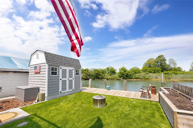 3717 Somerset Dr, Seaford, NY 11783 - view of green lawn with a water view and a dock