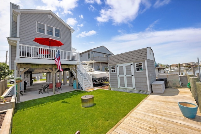 3717 Somerset Dr, Seaford, NY 11783 - rear view of house with a wooden deck, a patio area, a shingled roof, a residential view, and stairs