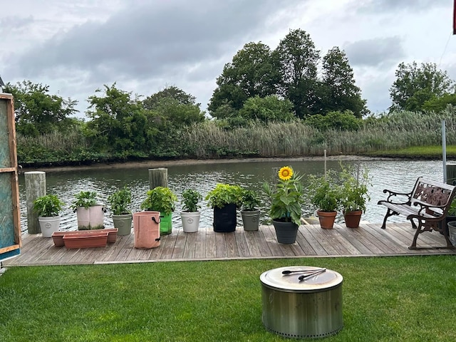 3717 Somerset Dr, Seaford, NY 11783 - wooden terrace with a water view and a yard
