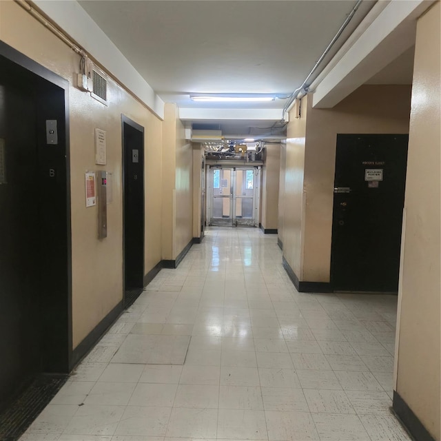 9 Fordham Hill Oval Unit 11D, Bronx, NY 10468 - hall with baseboards and elevator