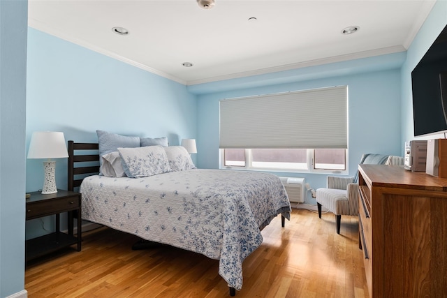 260 W Broadway Unit 2G, Long Beach, NY 11561 - bedroom featuring crown molding, light wood-style floors, and recessed lighting