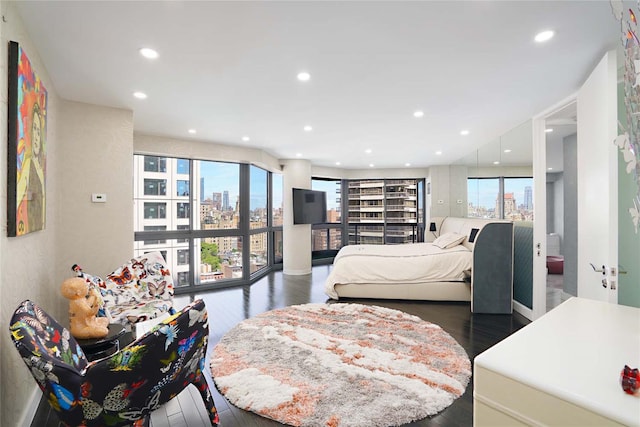 200 E 61st St Unit 19De, New York Manhattan, NY 10065 - bedroom with recessed lighting and wood finished floors