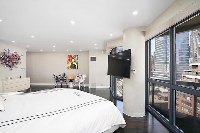 200 E 61st St Unit 19De, New York Manhattan, NY 10065 - bedroom with wood finished floors, baseboards, and recessed lighting