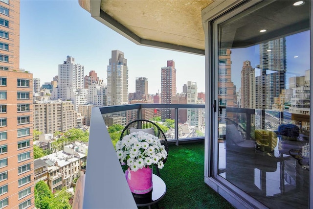 200 E 61st St Unit 19De, New York Manhattan, NY 10065 - balcony featuring a view of skyline