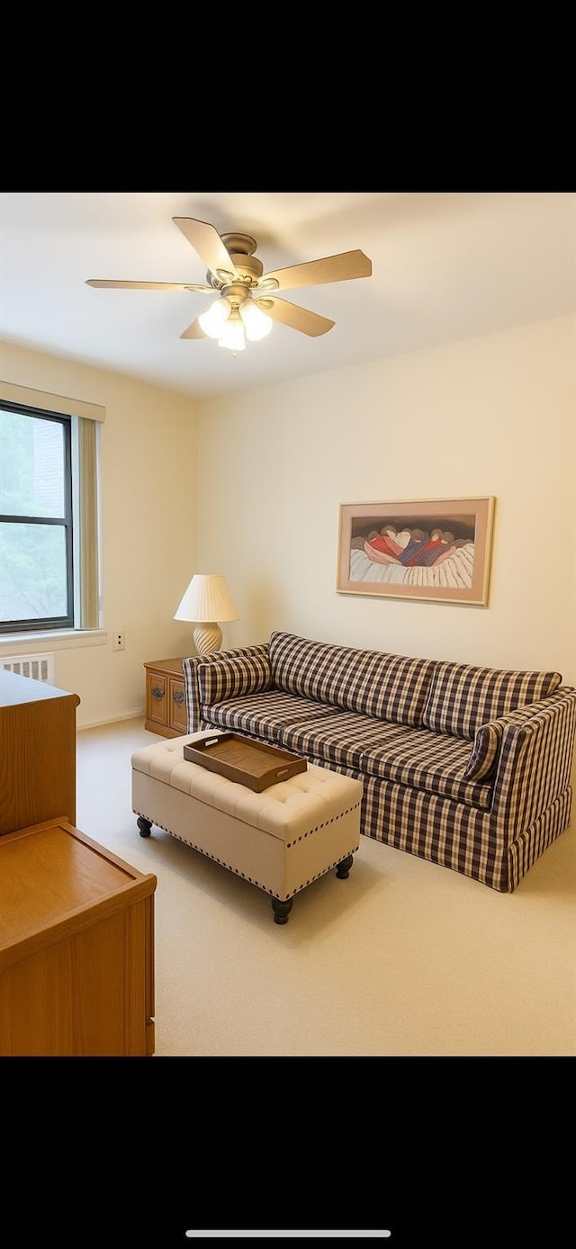 32-23 90th St Unit 103, East Elmhurst, NY 11369 - living room with carpet flooring and ceiling fan