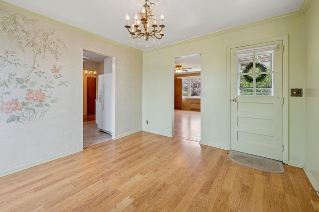 151AKA149 Stone Ave, Yonkers, NY 10701 - unfurnished dining area with a chandelier, light wood-type flooring, and ornamental molding