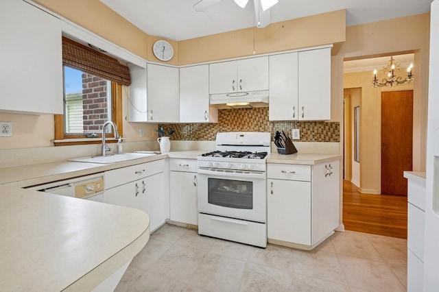151AKA149 Stone Ave, Yonkers, NY 10701 - kitchen with white appliances, under cabinet range hood, a chandelier, ceiling fan, and light countertops