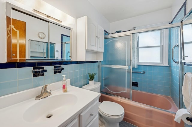 151AKA149 Stone Ave, Yonkers, NY 10701 - bathroom with healthy amount of natural light, vanity, shower / bath combination with glass door, and tile walls