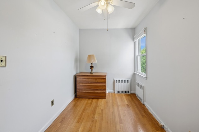 151AKA149 Stone Ave, Yonkers, NY 10701 - unfurnished room featuring radiator, light wood-style flooring, and a ceiling fan